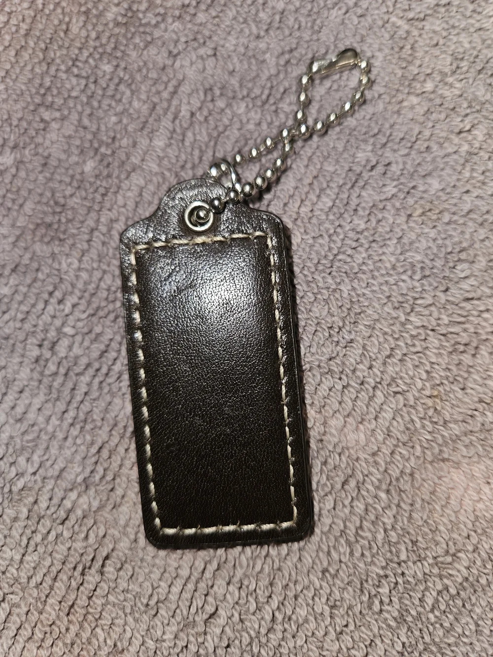 COACH Hangtag, Key Tag with Silver Key Charms. 25.00 Each